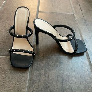 Anna Michelle size 6 black high heels with gold detailing